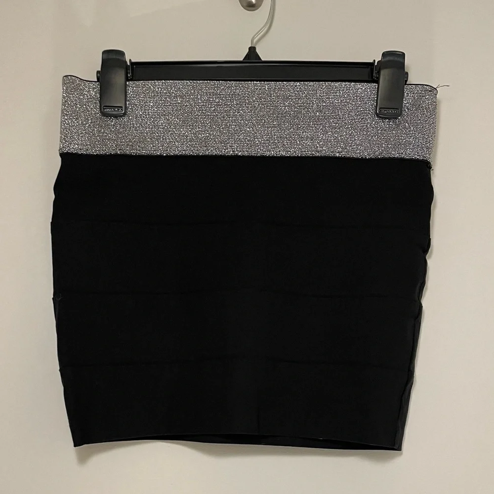 Black skirt with sparkly silver top. This is a size medium. - Picture 2 of 4